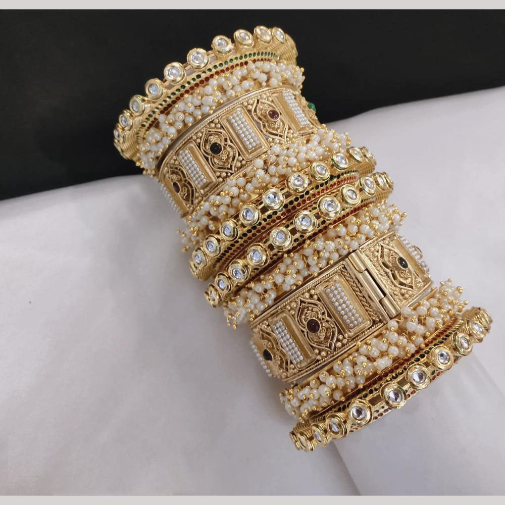 Lucentarts Jewellery Gold Plated Kundan And Pearl Bangles Set