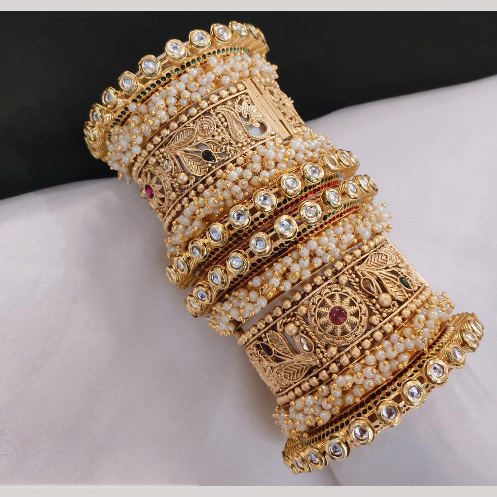 Lucentarts Jewellery Gold Plated Kundan And Pearl Bangles Set