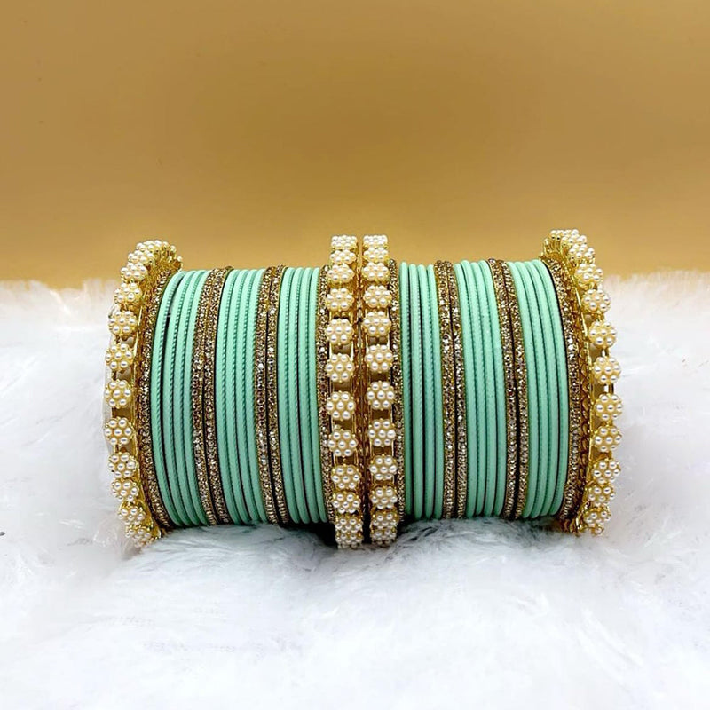 Pooja Bangles Gold Plated Austrian Stone Pearl Bangle Set