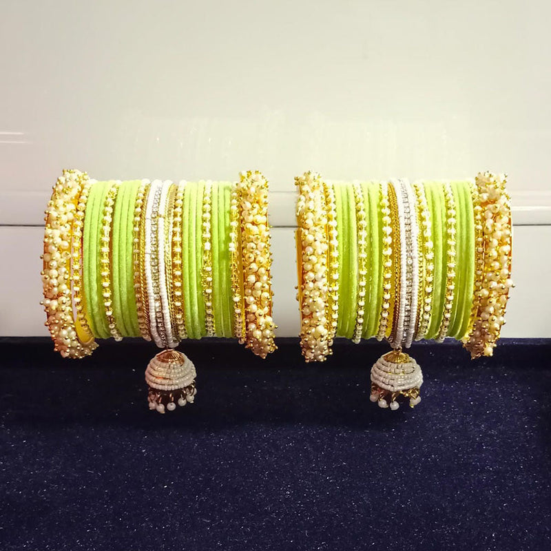 Pooja Bangles Gold Plated Austrian Stone And Pearls Velvet Bangles Set