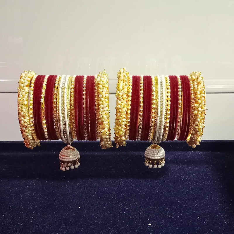 Pooja Bangles Gold Plated Austrian Stone And Pearls Velvet Bangles Set