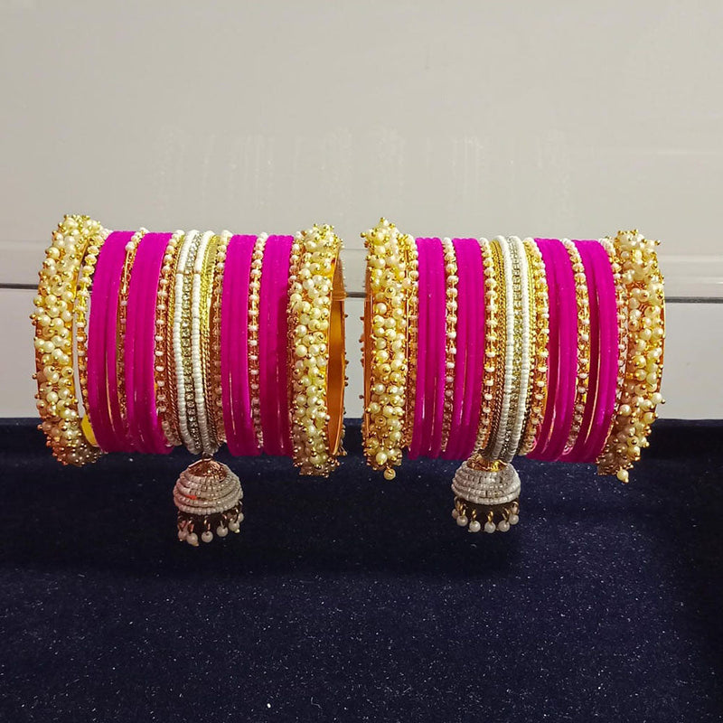 Pooja Bangles Gold Plated Austrian Stone And Pearls Velvet Bangles Set