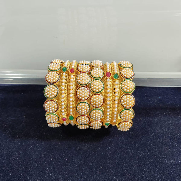 Pooja Bangles Gold Plated Pearl And Pota Stone Bangle Set