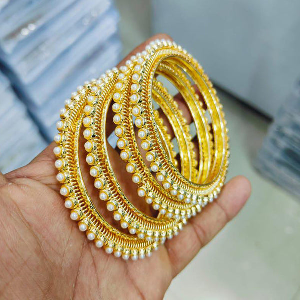 Pooja Bangles Gold Plated Pearls Bangle Set