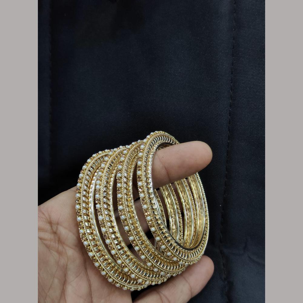 Pooja Bangles Radiant Pearls Festive Wear Embellished Bangle Set