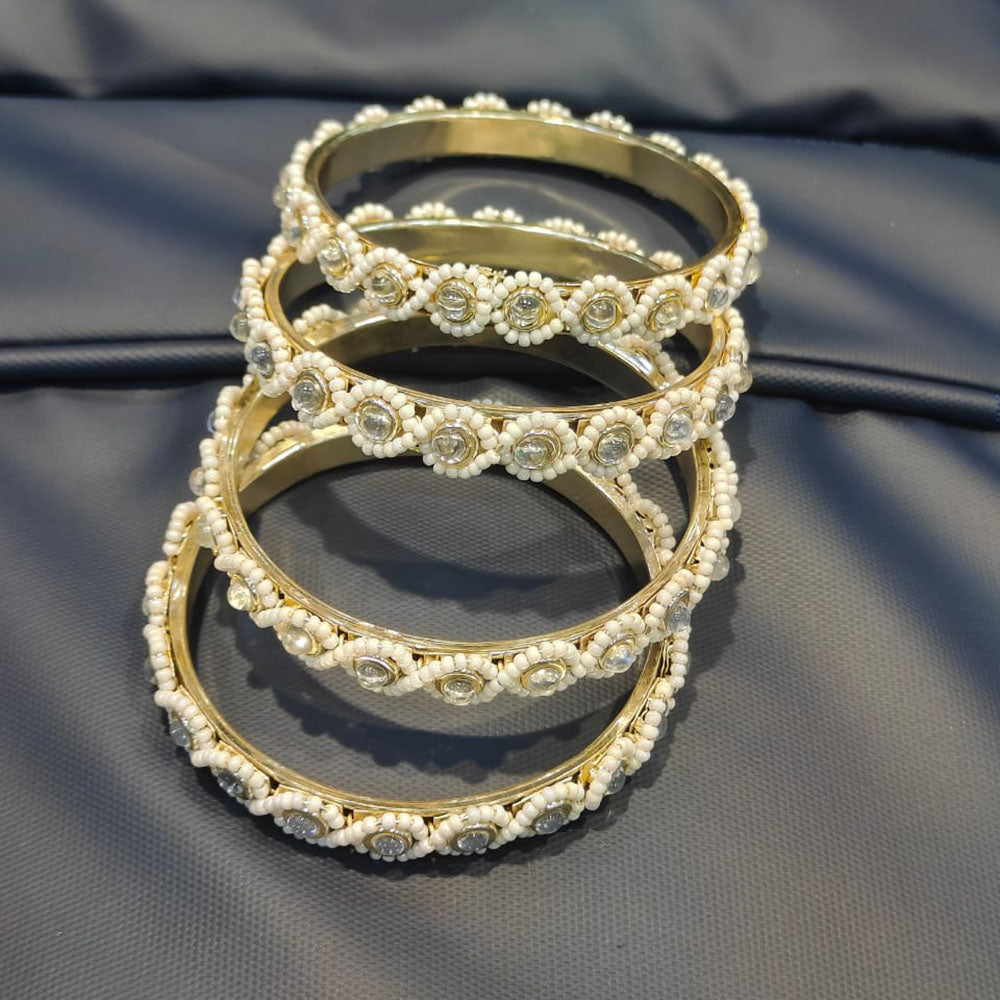 Pooja Bangles Shine Divine Kundan Stone And Pearl Bangles Set