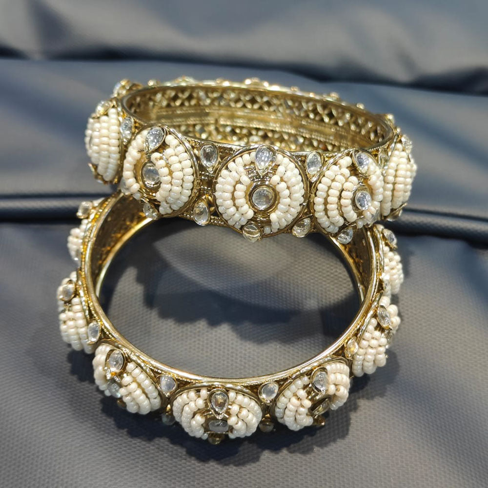 Pooja Bangles Shine Divine Kundan Stone And Pearl Bangles Set