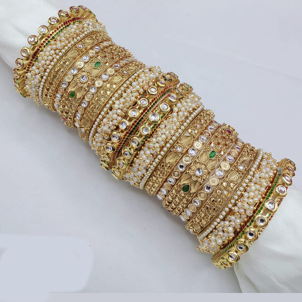 Pooja Bangles Elegant Shine Kundan Stone And Pearl Bangle Set