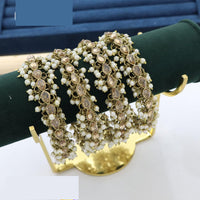 Pooja Bangles Dazzling Crystal And Pearl Bangles Set For All Occassions