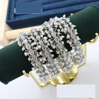 Pooja Bangles Dazzling Crystal And Pearl Bangles Set For All Occassions