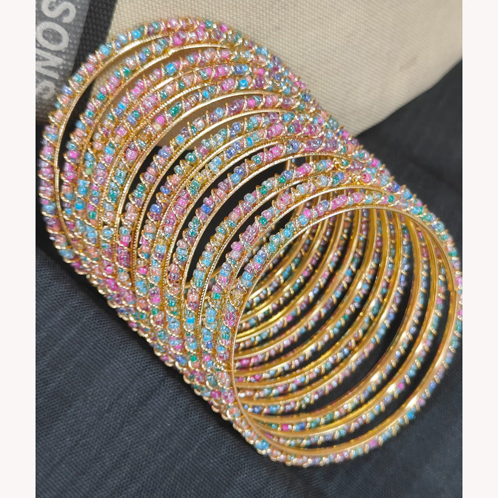 Pooja Bangles Graceful Pearl Embellished Bangles Set