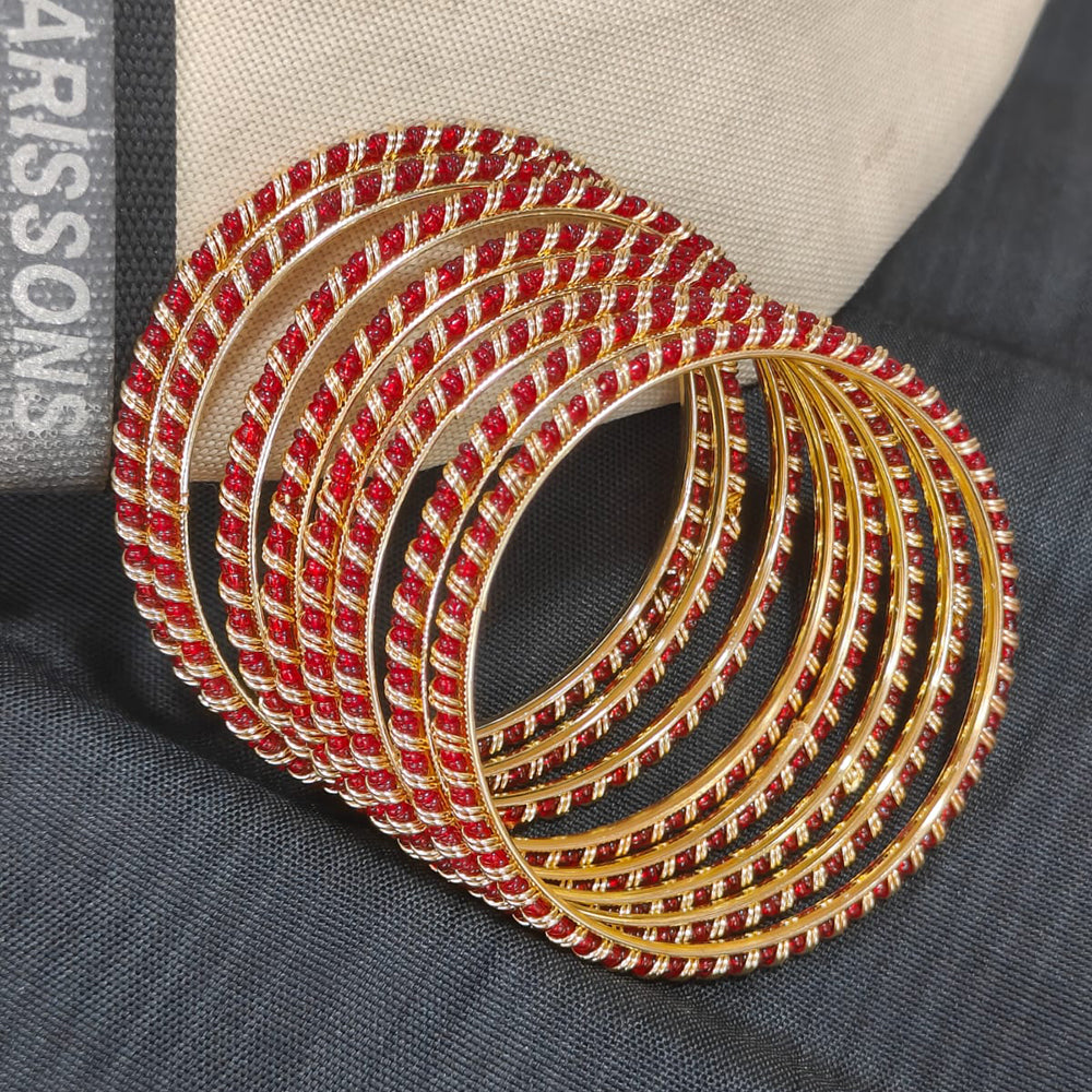 Pooja Bangles Graceful Pearl Embellished Bangles Set