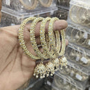 Pooja Bangles Kundan Stone Graceful Pearl Embellished Bangles Set
