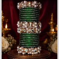 Pooja Bangles Glamorous Austrian Stone Pearl Occasion Wear Bangles Set