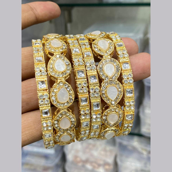 Hira Collections Gold Plated Kundan Stone And Austrian Stone Bangles Set