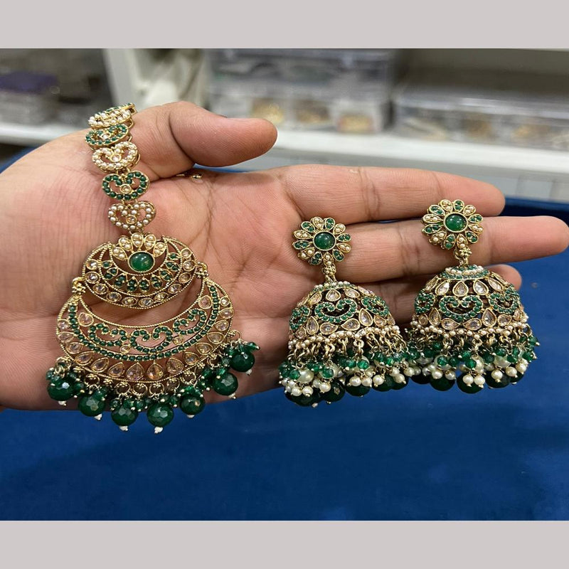 Hira Collections Gold Plated Crystal Stone And Pearls Jhumki Earrings With Maangtikka