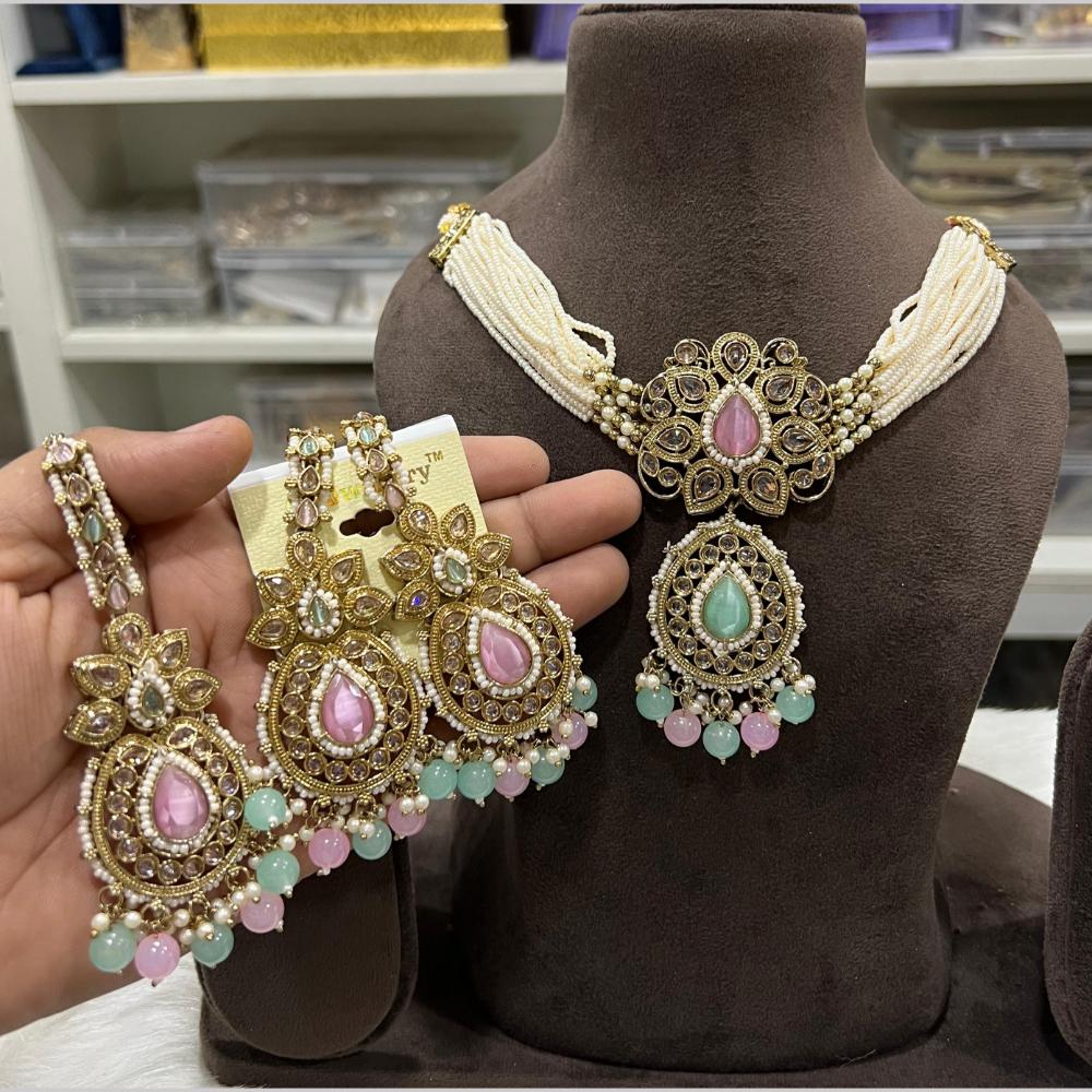 Hira Collections Gold Plated Royal Crystal Stone And Pearl Necklace Set