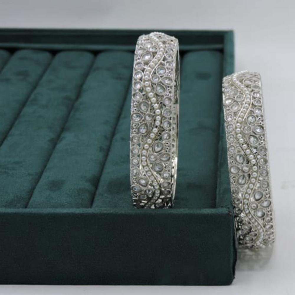Hira Collections Elegant Rhodium Plated Crystal Stone And Pearl Bangles Set