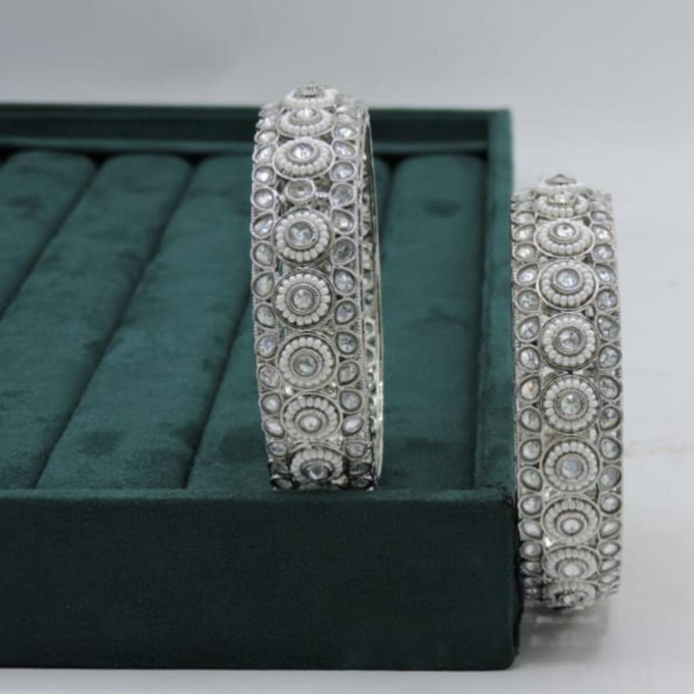 Hira Collections Elegant Rhodium Plated Crystal Stone And Pearl Bangles Set