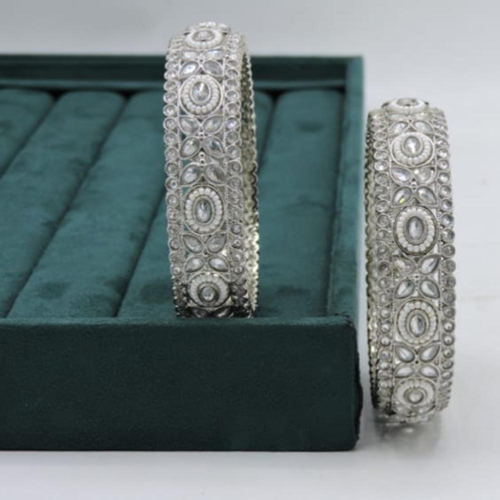 Hira Collections Elegant Rhodium Plated Crystal Stone And Pearl Bangles Set