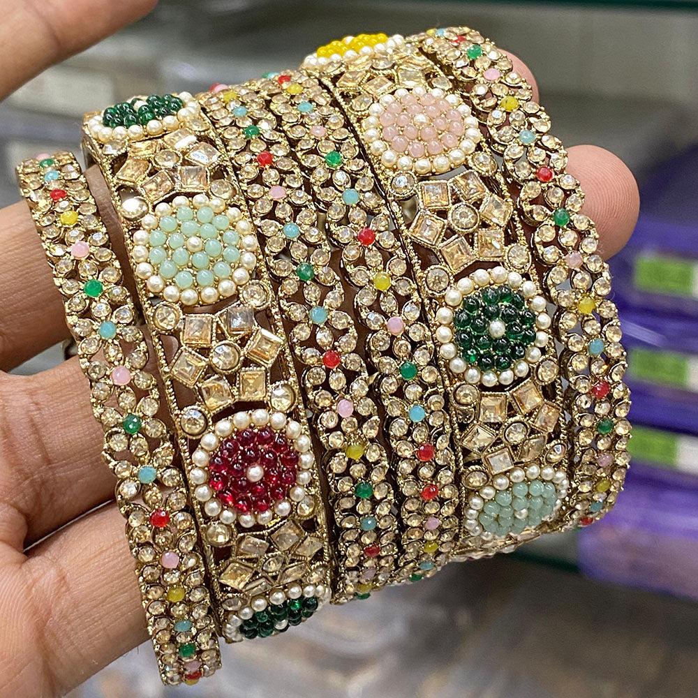 Hira Collections Royal Look Sparkling Crystal Stone And Pearl Designer Bangles Set