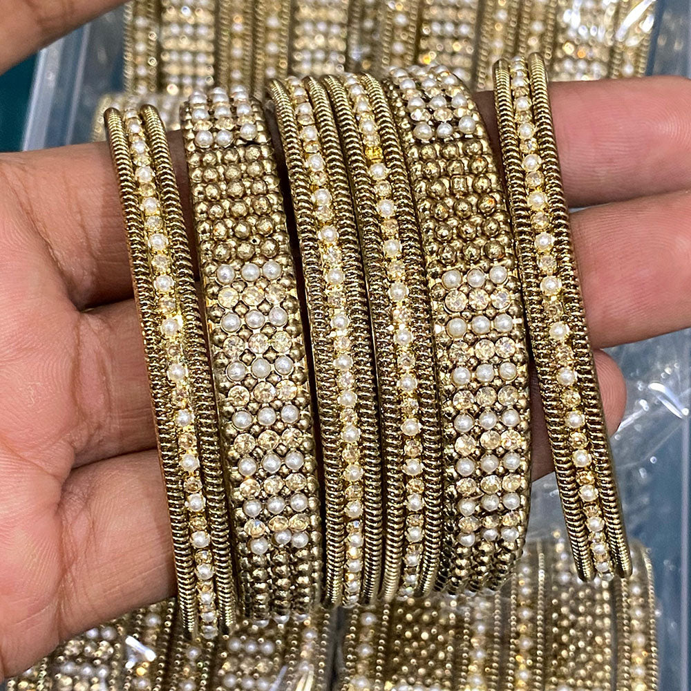 Hira Collections Royal Look Sparkling Austrian Stone And Pearl Designer Bangles Set