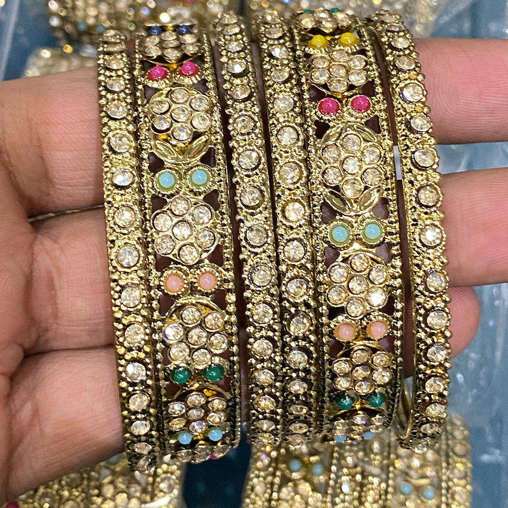 Hira Collections Royal Look Sparkling Austrian Stone And Pearl Designer Bangles Set