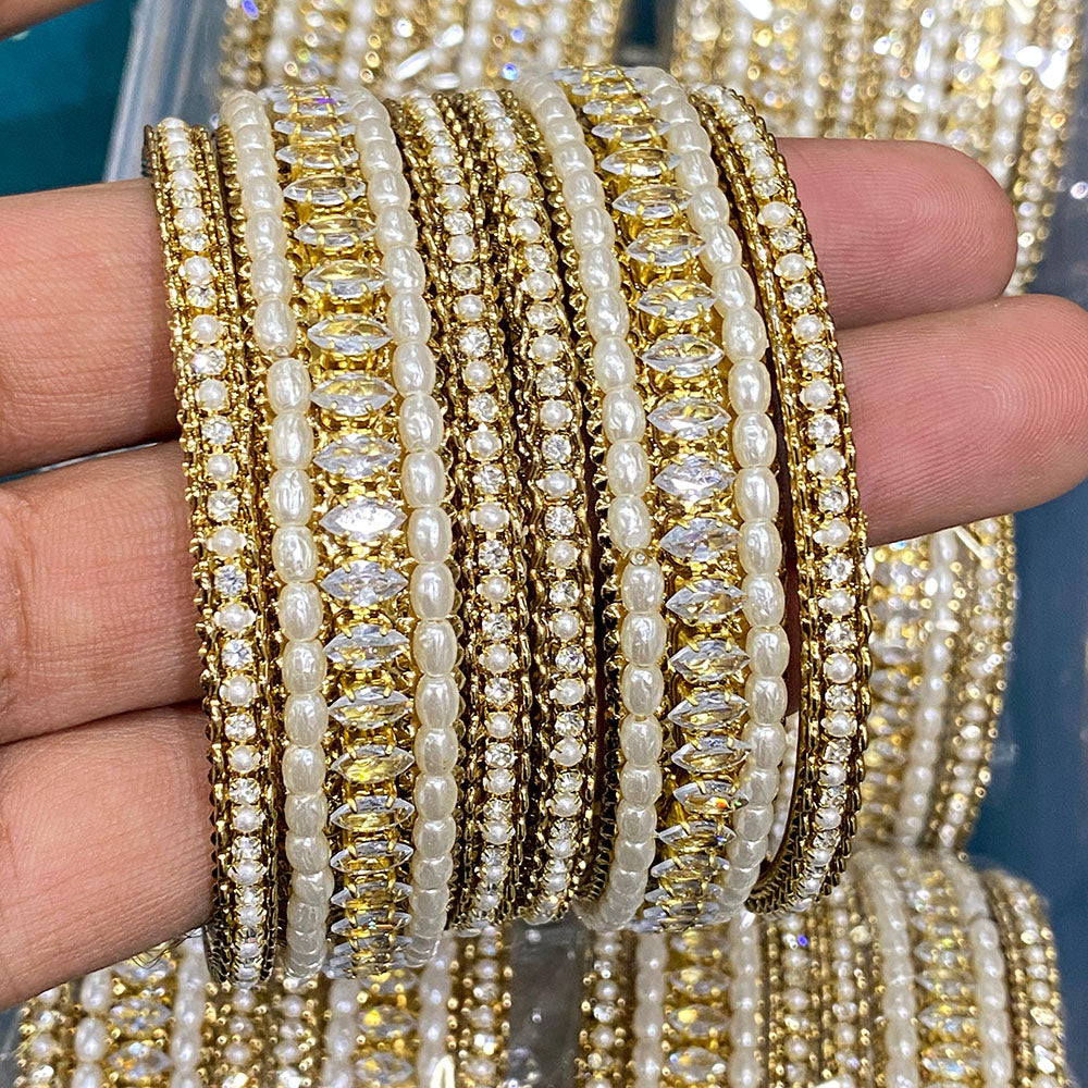 Hira Collections Elegant American Diamond And Pearl Bangles Set