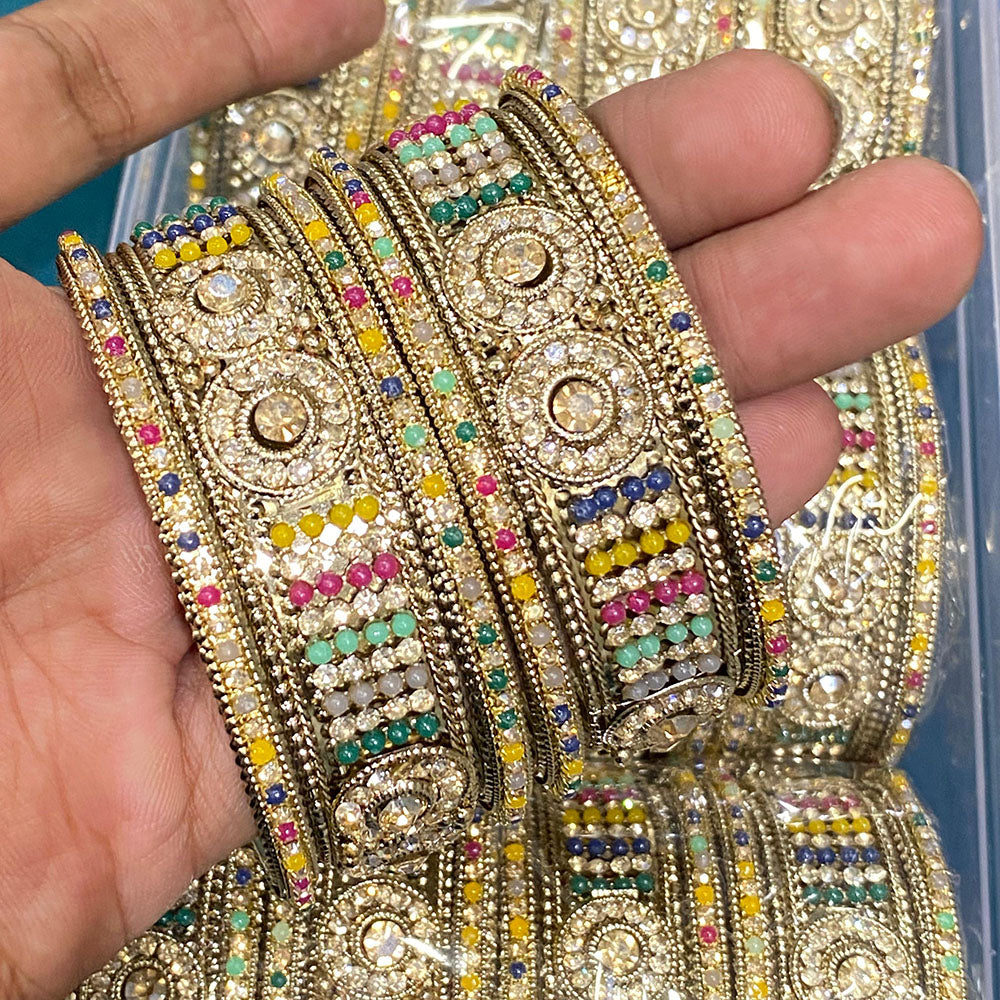 Hira Collections Royal Look Sparkling Austrian Stone And Pearl Designer Bangles Set