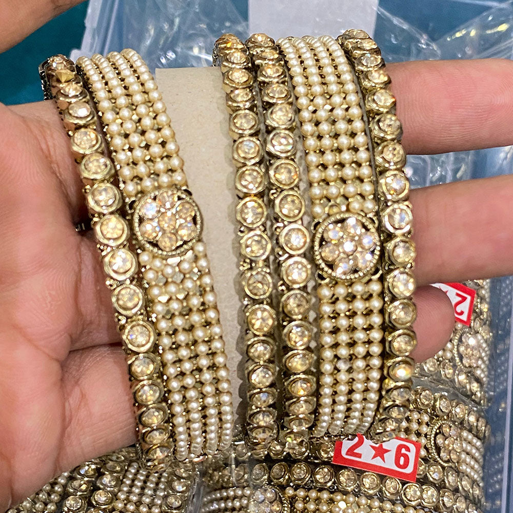 Hira Collections Royal Look Sparkling Austrian Stone And Pearl Designer Bangles Set