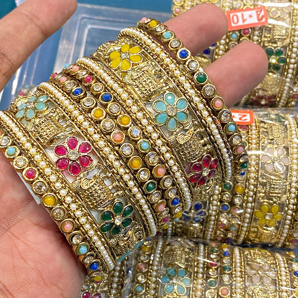 Hira Collections Royal Look Sparkling Crystal Stone And Pearl Designer Bangles Set