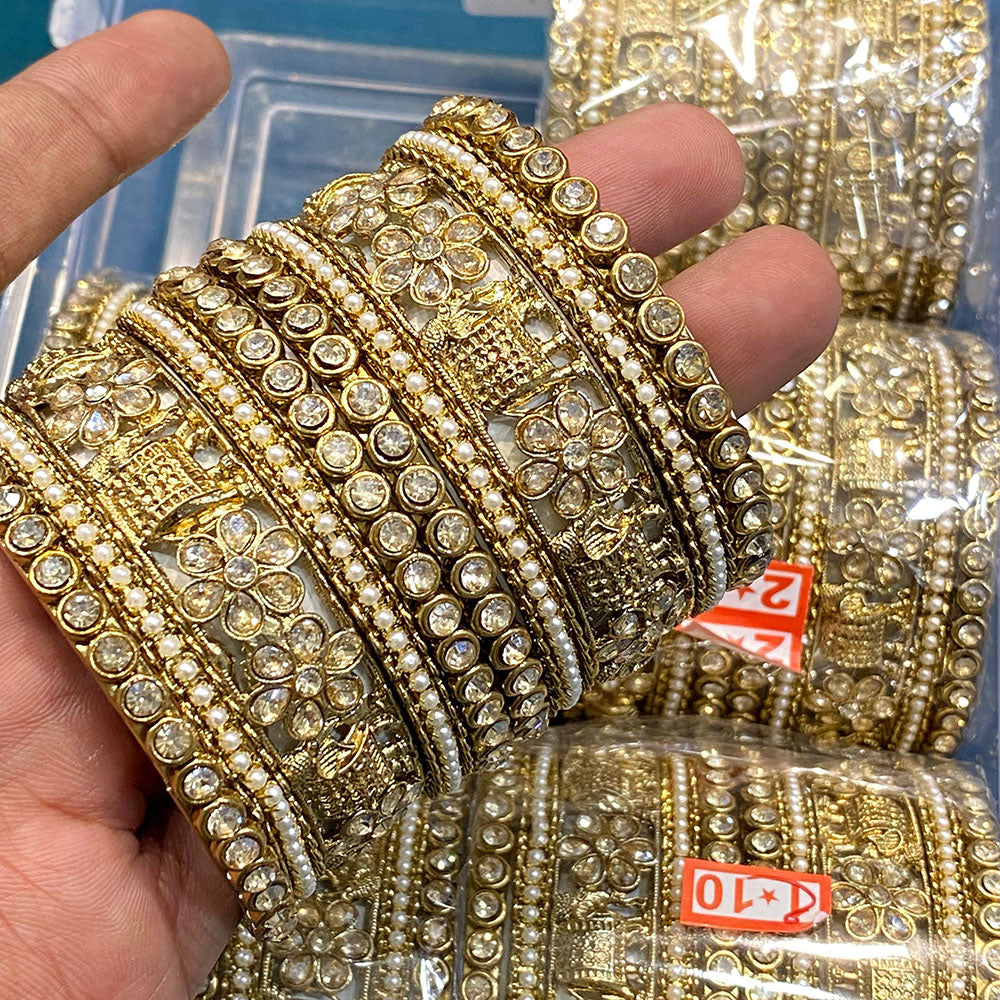 Hira Collections Royal Look Sparkling Crystal Stone And Pearl Designer Bangles Set