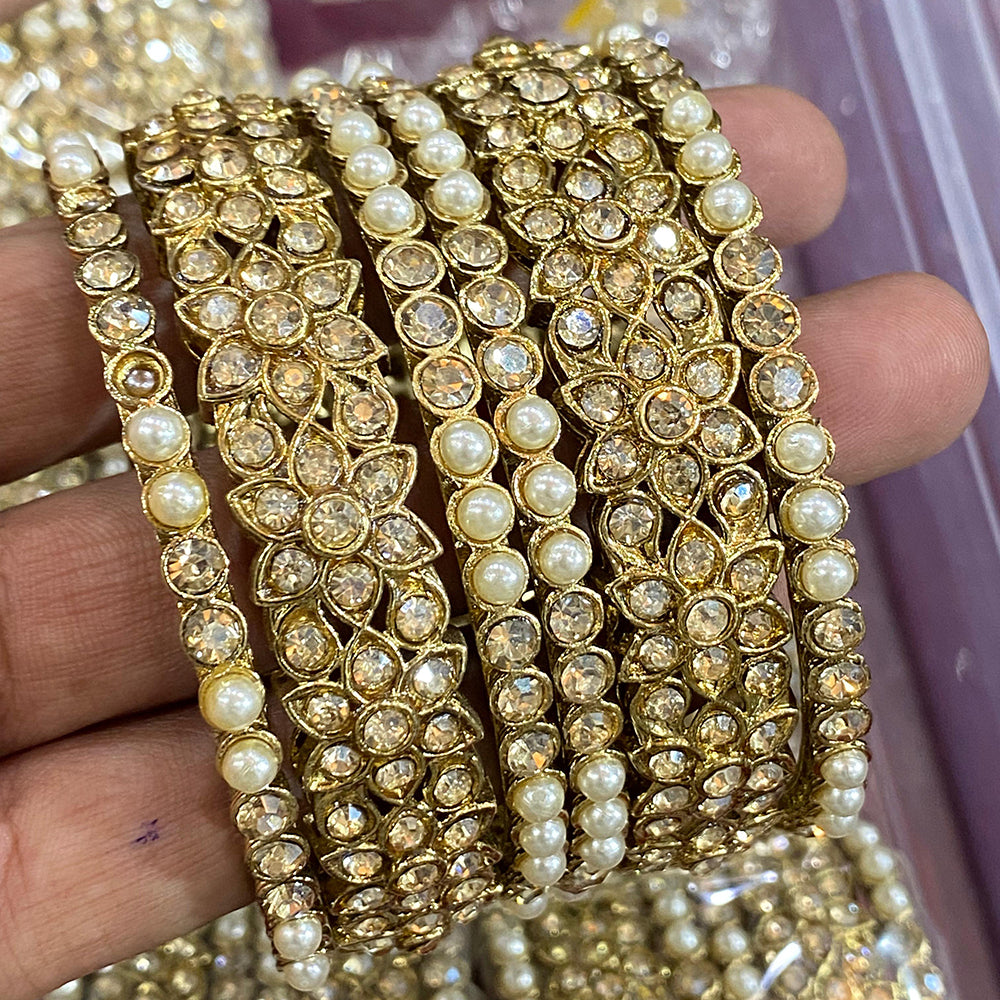Hira Collections Divine Sparkle Kundan Stone And Pearl Bangles Set