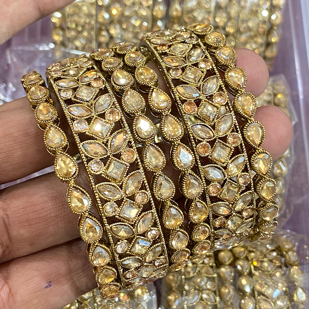 Hira Collections Ethnic Glow Kundan Stone Bangles Set