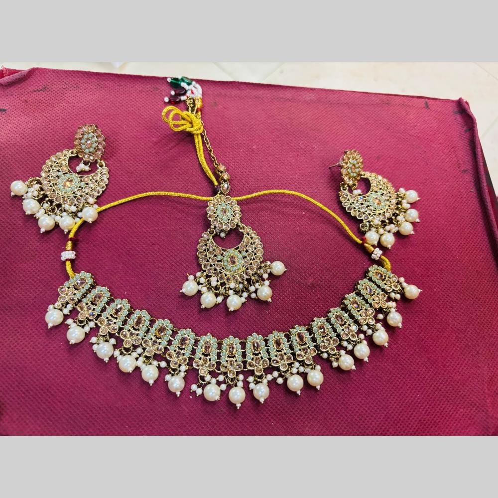 Snera Elegant Austrian Stone Necklace Set with Matching Earrings And Mangtikka