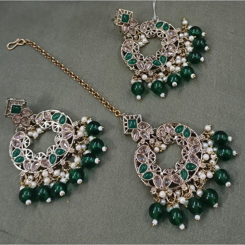 Akruti Collection Gold Plated Crystal Stone Earrings With Maangtikka