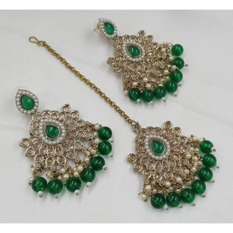 Akruti Collection Gold Plated Crystal Stone Earrings With Maangtikka