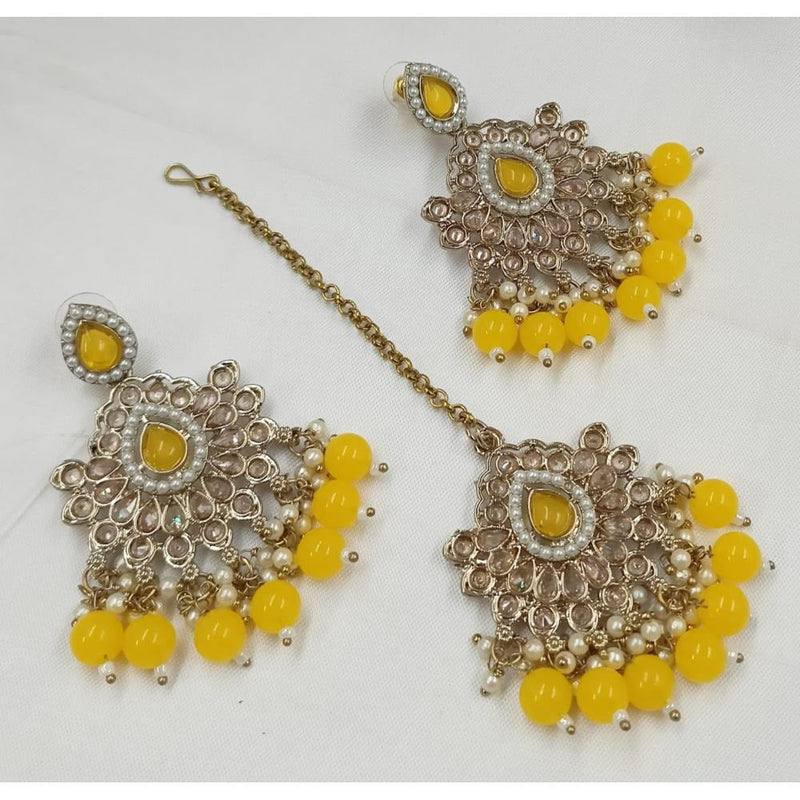 Akruti Collection Gold Plated Crystal Stone Earrings With Maangtikka