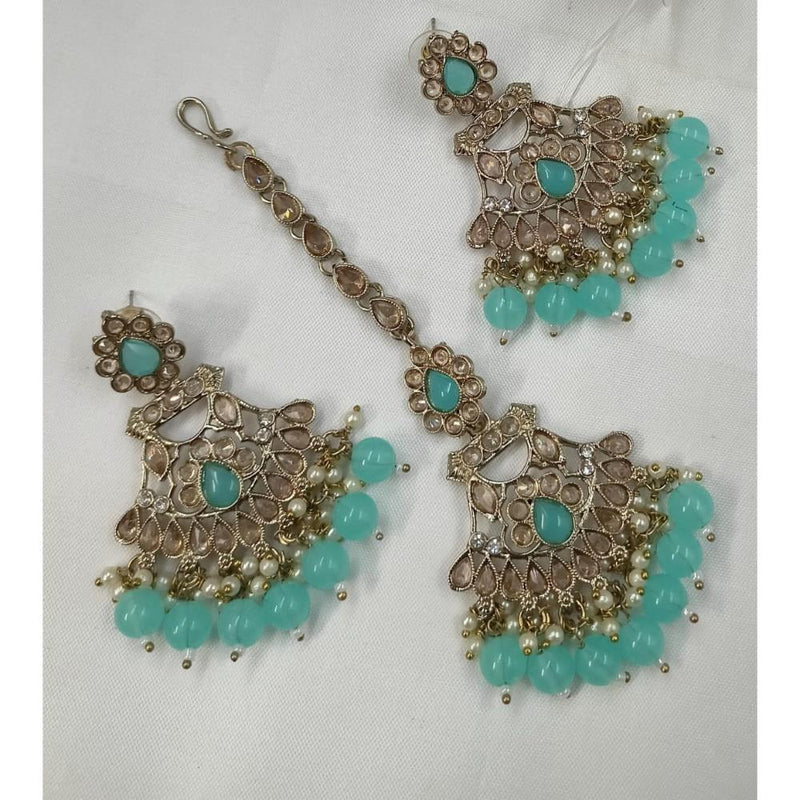 Akruti Collection Gold Plated Crystal Stone Earrings With Maangtikka