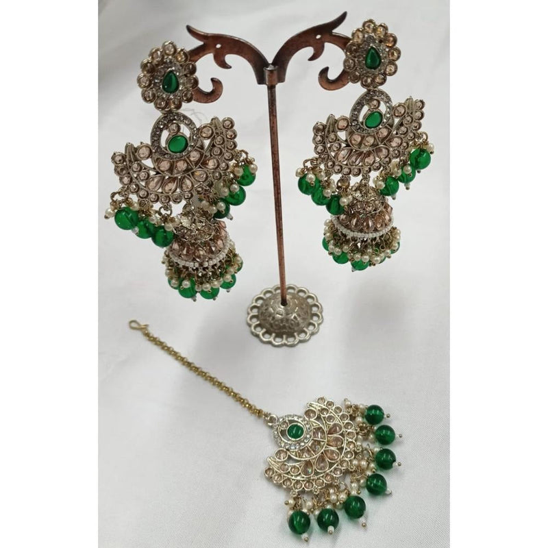 Akruti Collection Gold Plated Crystal Stone Earrings With Maangtikka