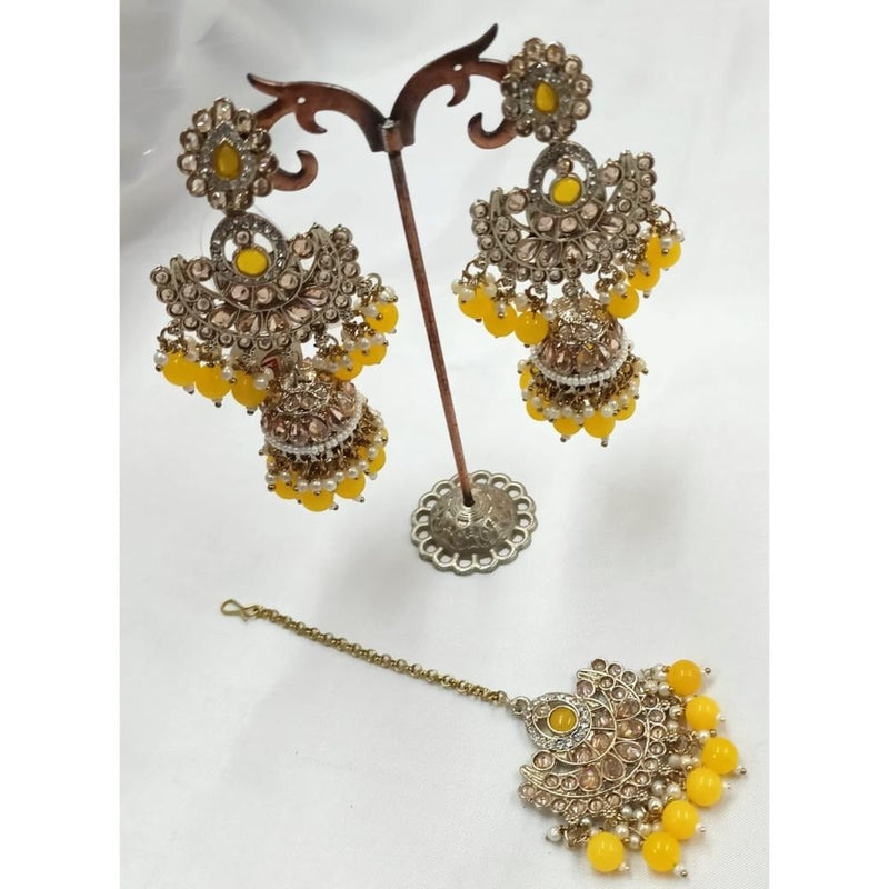 Akruti Collection Gold Plated Crystal Stone Earrings With Maangtikka