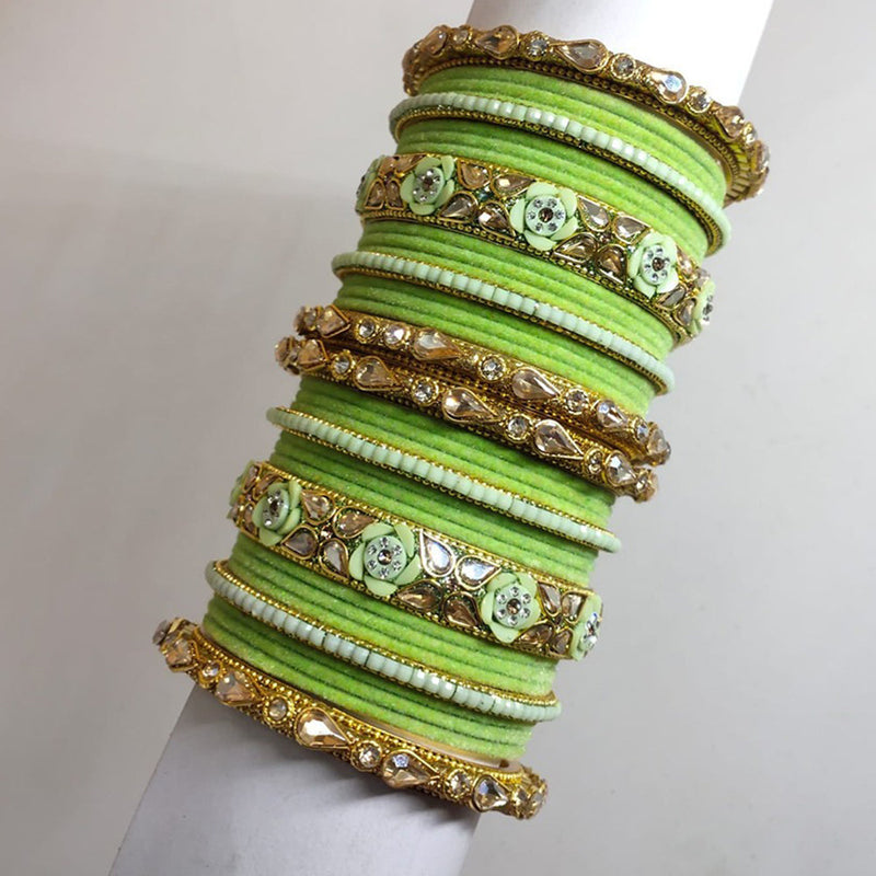 Akruti Collection Gold Plated Crystal Stone And Velvet Bangle Set