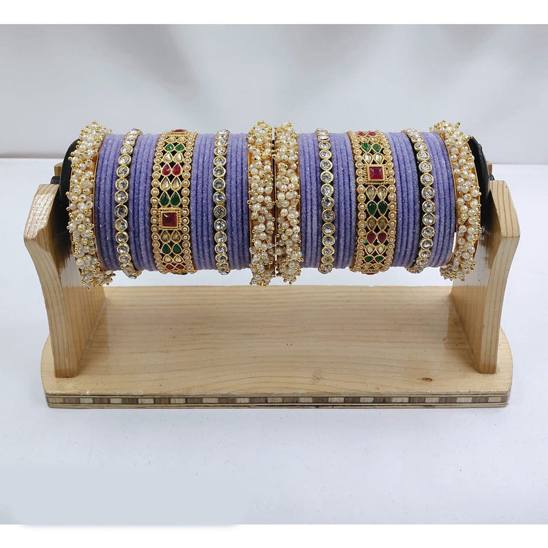 Akruti Collection Gold Plated Kundan Stone & Pearls Velvet Bangles Set