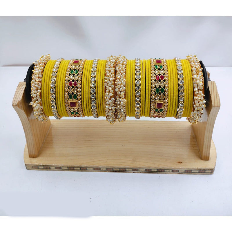 Akruti Collection Gold Plated Kundan Stone & Pearls Velvet Bangles Set