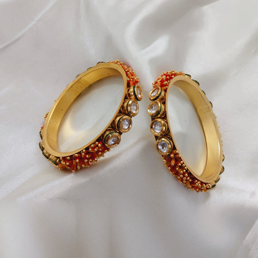 Akruti Collection Gold Plated Kundan Stone And Pearls Bangle Set