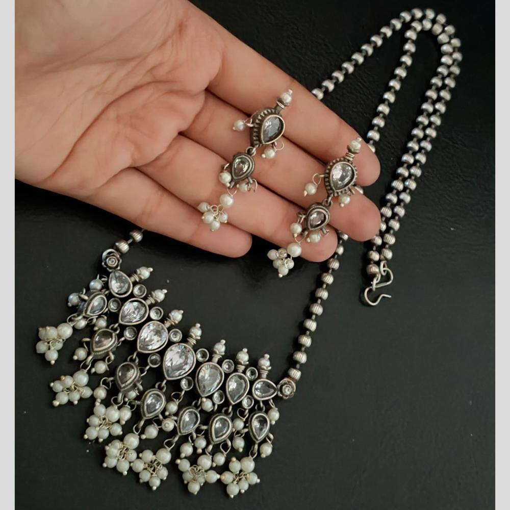 Akruti Collection Oxidised Plated Pota Stone And Pearl Long Necklace Set