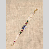 Akruti Collection Rakhi with Pearl Detailing – Celebrate Raksha Bandhan in Style