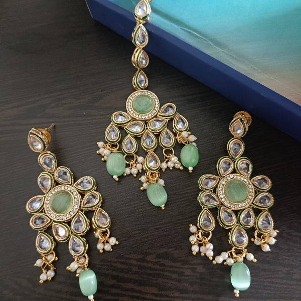 Exotica Collection Gold Plated Reveres AD Earring With Maangtikka