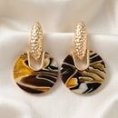 Exotica Collection Gold Toned Green Resin Geometric Dangler Earrings