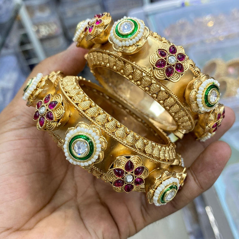 JCM Gold Plated Pota Stone And Pearls Meenakari Openable Bangles Set